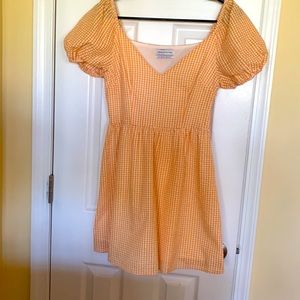 Orange and white checkered mini dress by Urban Outfitters, size S.